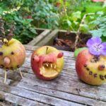 ¿Cómo hacer manzanas espeluznantes para Halloween?