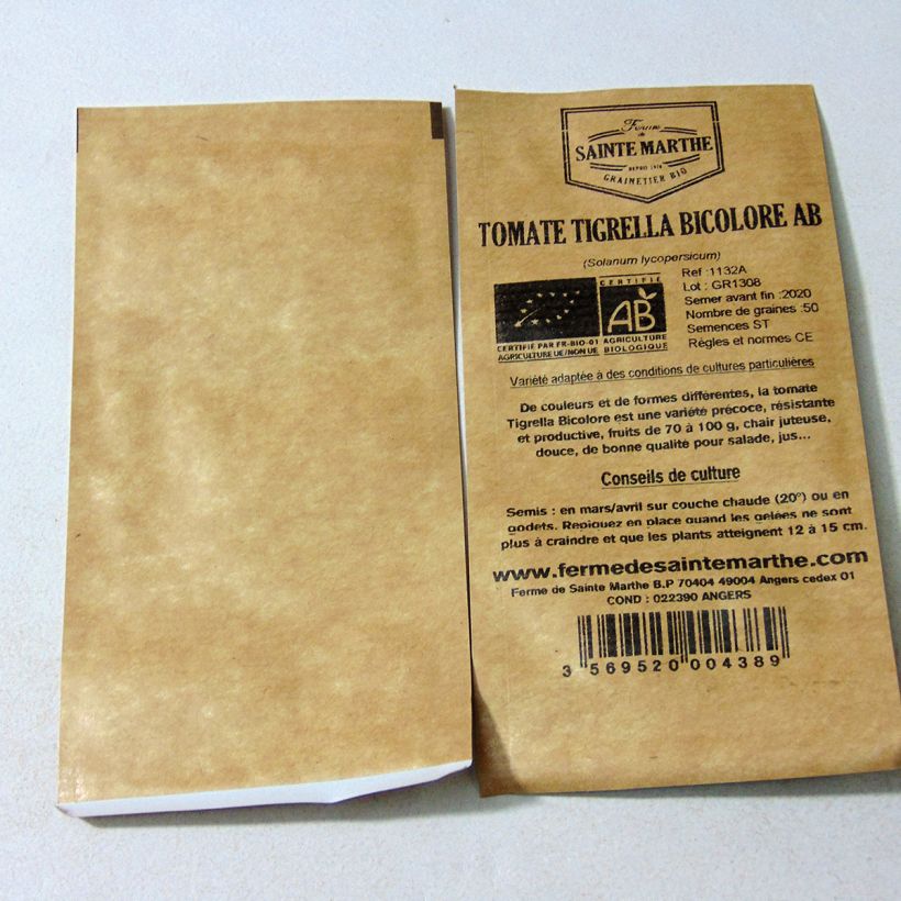 Ejemplo de ejemplar de Tomate Tigerella bicolore Bio - Ferme de Sainte Marthe Graines tal y como se entrega